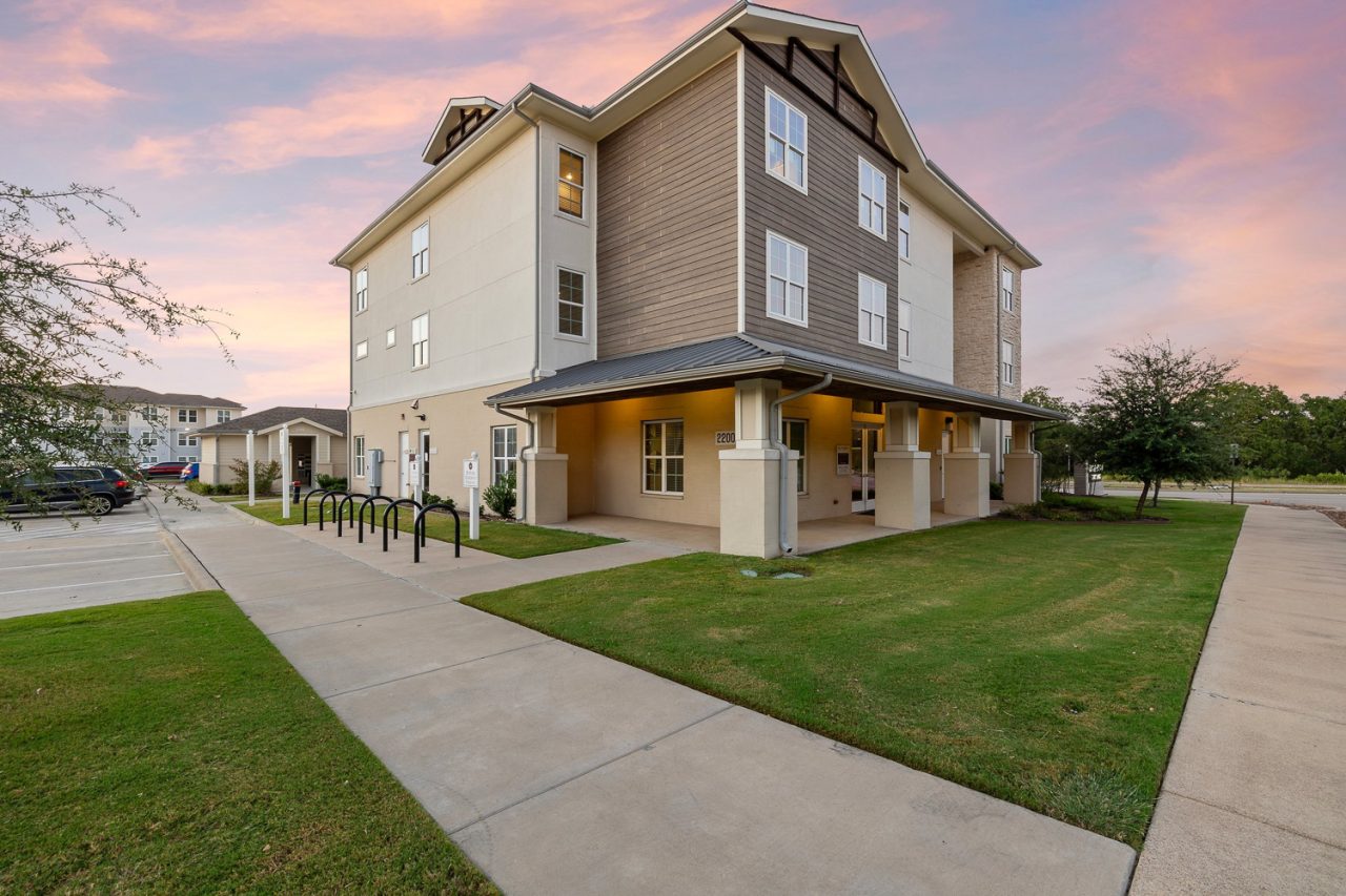 holleman crossing apartments near texas am building exterior bike storage