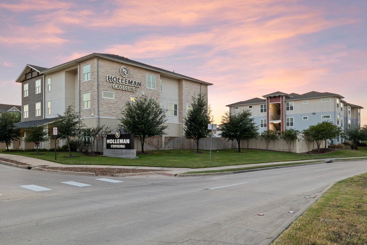 holleman crossing apartments near texas am building exterior main entrance