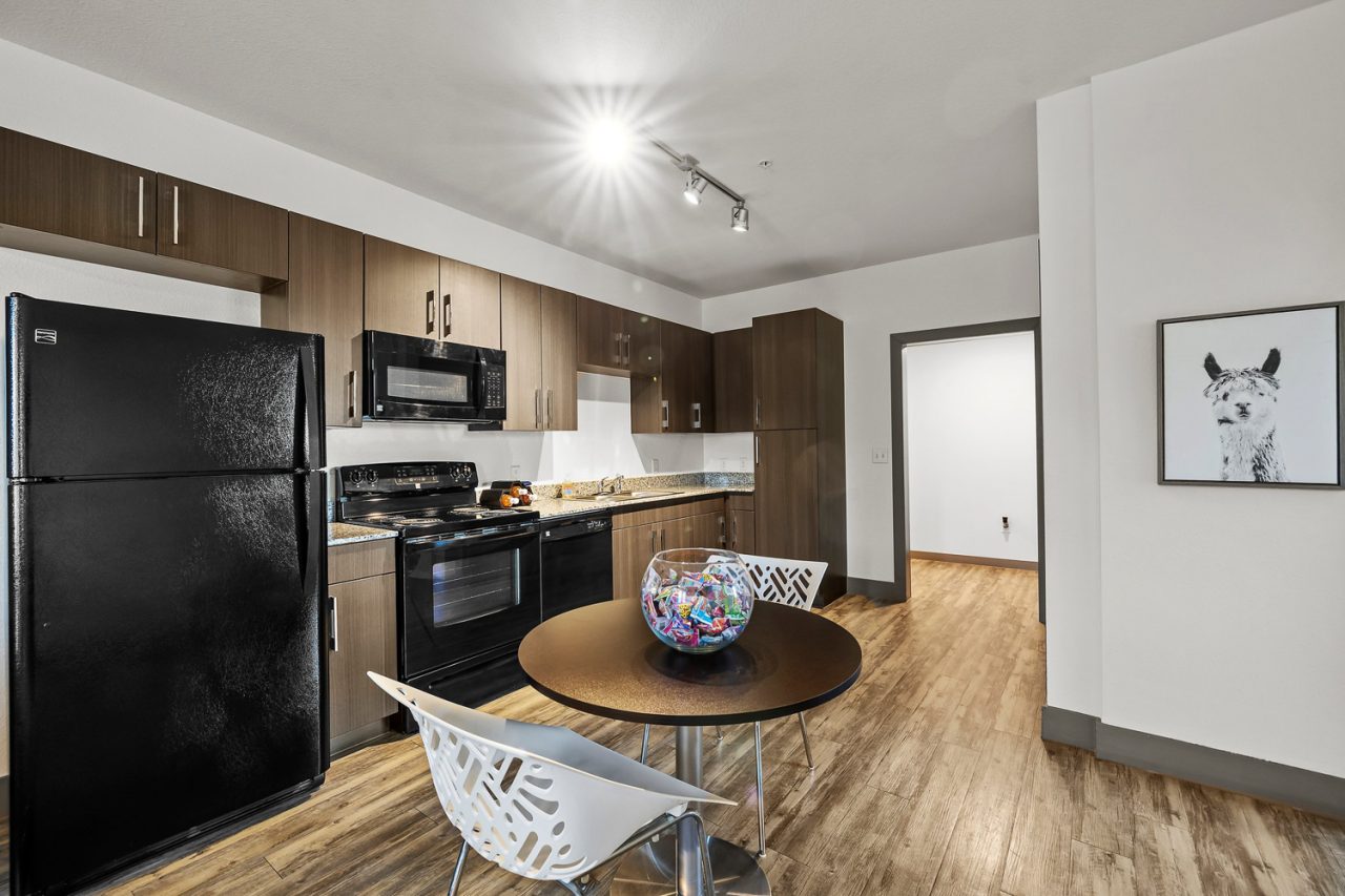 holleman crossing apartments near texas am kitchen and dining table