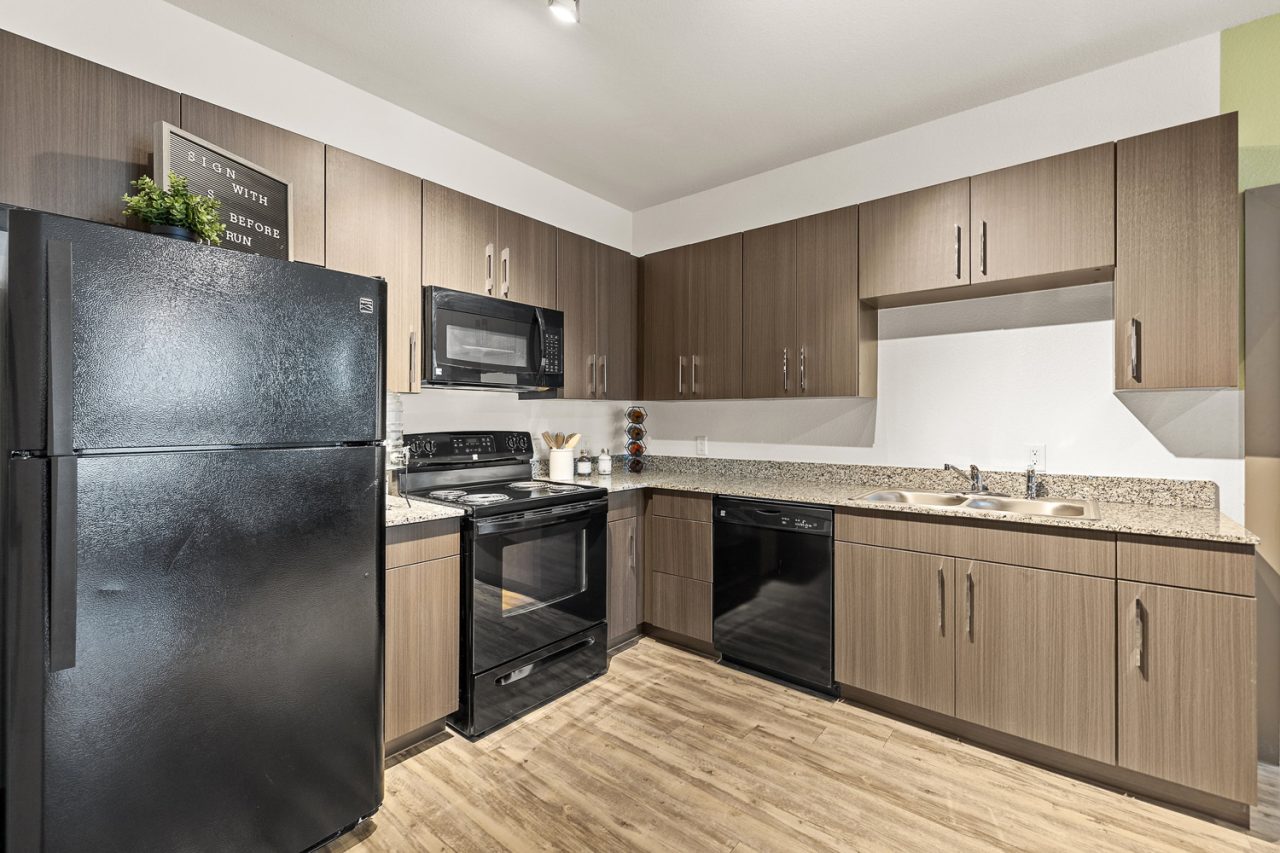 holleman crossing apartments near texas am kitchen black appliances