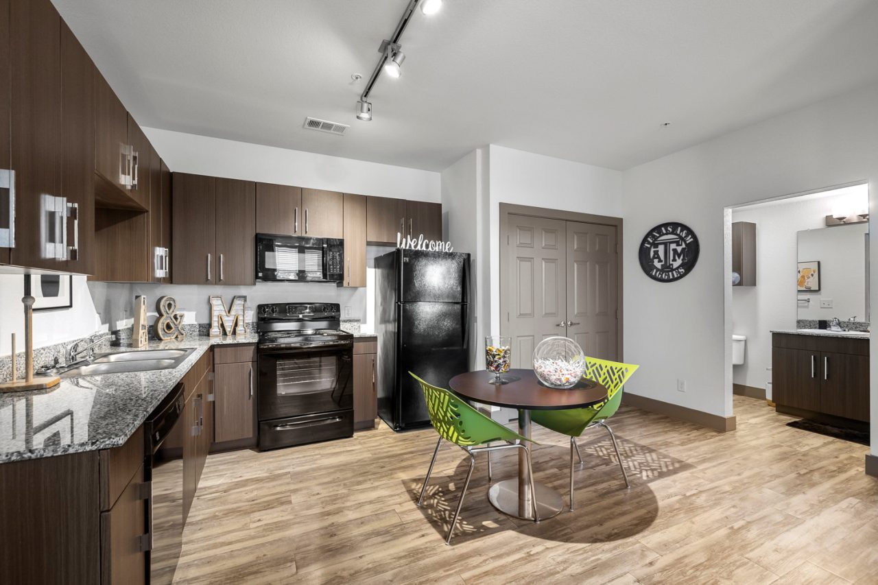 holleman crossing apartments near texas am kitchen wood flooring