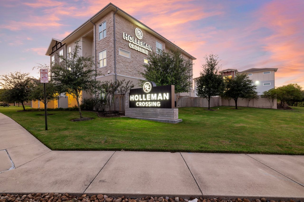 holleman crossing apartments near texas am monument sign