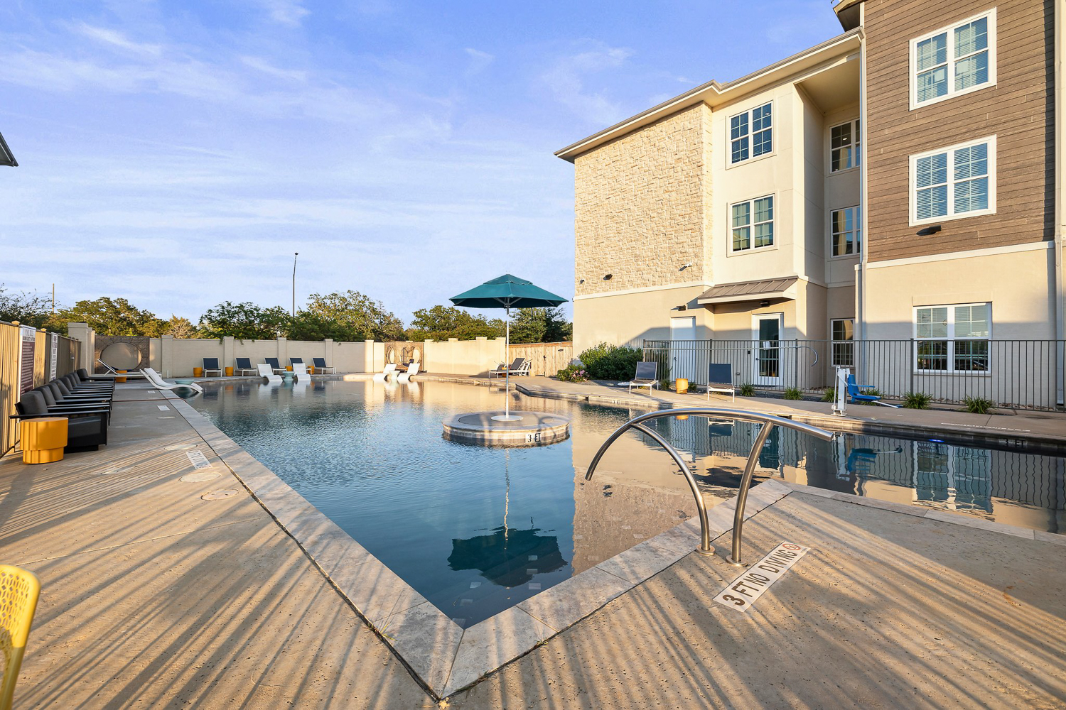 holleman crossing apartments near texas am pool lounge seating