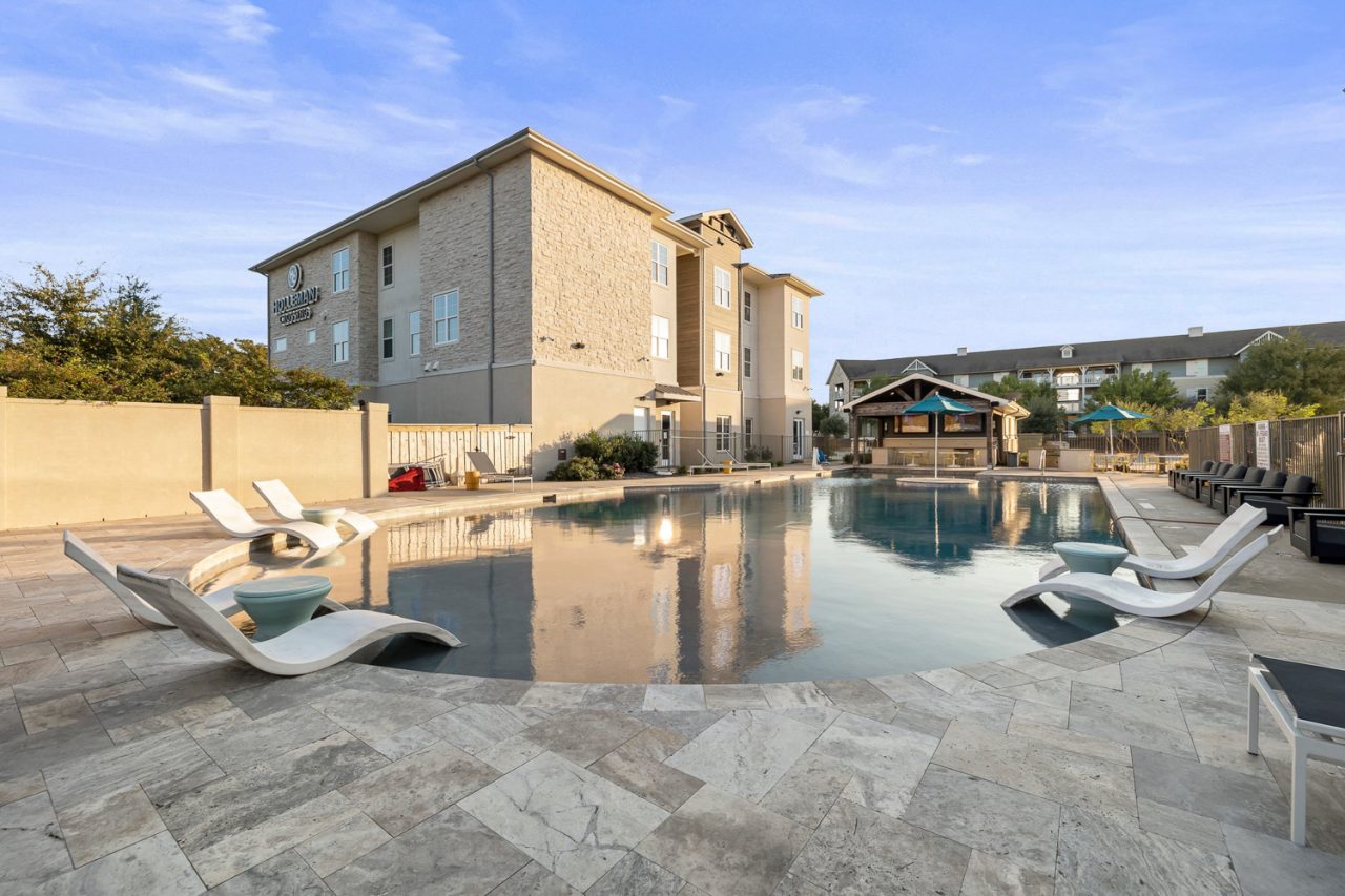 holleman crossing apartments near texas am pool outdoor lounge cabana